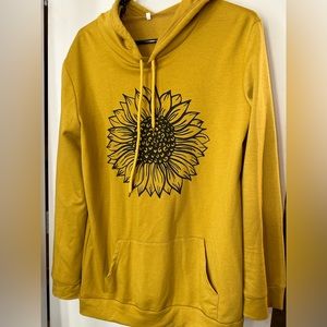 Mustard colored sunflower size medium hoodie.